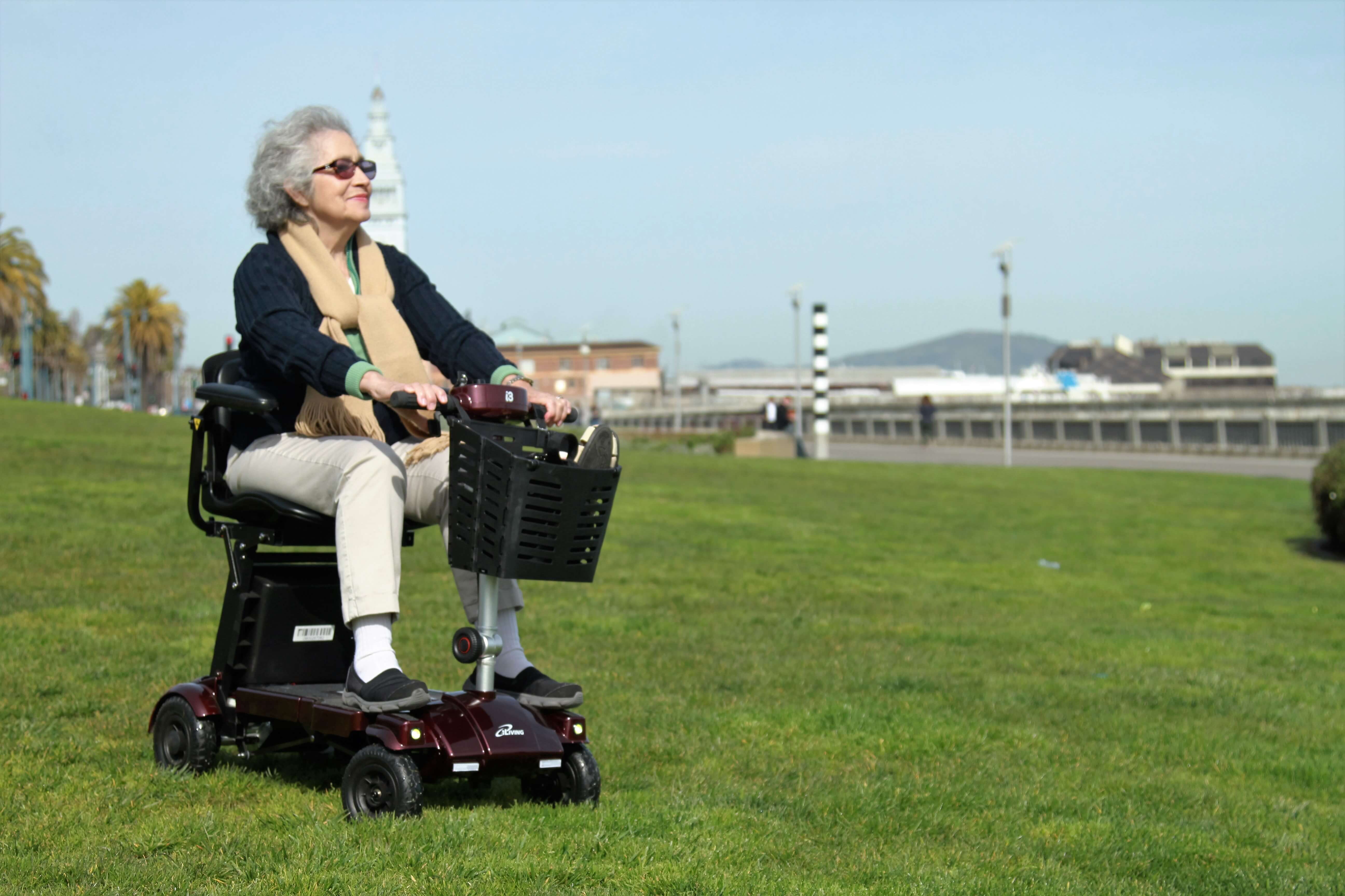 Lady enjoying her i3 folding mobility scooter 
