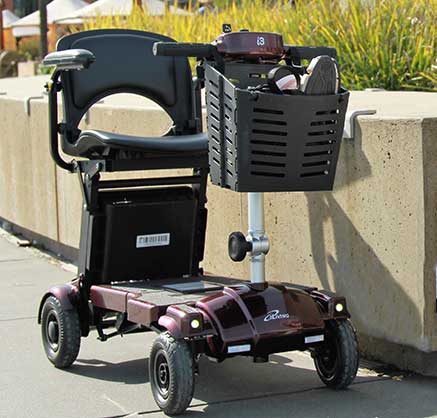 i3 folding scooter on pavement  i3 folding scooter on pavement